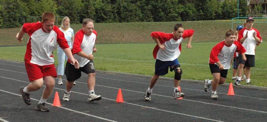 Four athletes beginning a race