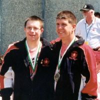 Two Oakville Athletes showing their medals