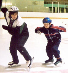 Coaching a new Speed Skating athlete on correct starting position