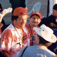 Two athletes greeted by audience